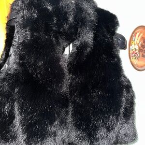Brand new Garage faux fur vest